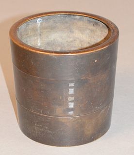 Bronze pot center with five inlaid silver swatches, plus two small in each of upper and lower section, height 7 inches, diameter 7 1/4 inches