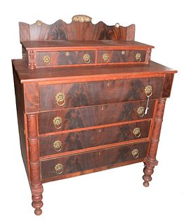 Sheraton Chest
having gallery back over two drawers, over four drawers, on turned legs
overall grain painted, with mahogany drawer fronts, circa 1830
