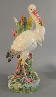 Large Majolica walking stick stand in the shape of a stork, marked to the underside, height 20 1/2 inches