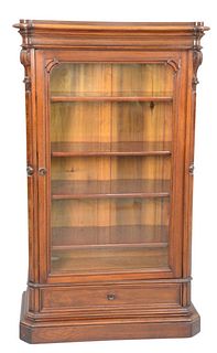 Walnut Victorian Bookcase 
with glass door and one drawer
height 62 3/4 inches, width 36 1/2 inches, depth 17 inches
Provenance: Thirty-five year coll