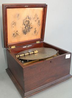 Regina Music Box
11" disc player, in mahogany case
height 8 3/4 inches, width 14 inches, depth 12 3/4 inches