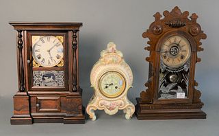Group of Three Mantle Clocks
to include ceramic clock with enameled face; rosewood Regulator clock along with a William L. Gilbert Victorian mantle cl