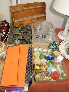 Four Tray Lots 
to include glass paperweights; toy tanks and cannons; men's ties including two Hermes; two cut glass decanters; seven glass plates and