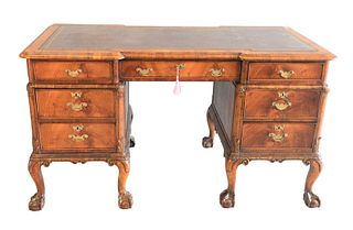 George III Style Walnut Knee-hole Desk
with leather tooled top, all set on ball and claw feet 
height 30 inches