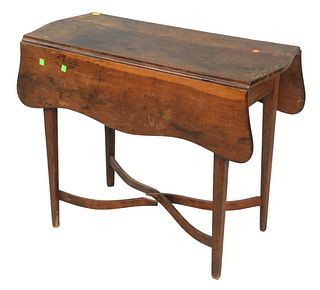 Federal Cherry Drop Leaf Pembroke Table
c. 1800
with arched stretchers
height 26 1/2 inches
top closed: 15" x 33 1/2"
Provenance: The Estate of Diana 