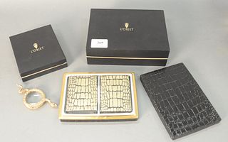 L'Object Two-Piece Lot
to include a magnifying glass, with snake motif, along with a playing card holder
both in original boxes
Provenance: The Gloria