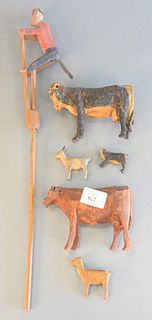 Group of Six Carved Wooden Items
to include five carved and painted animal figures along with a monkey on a stick toy
with 1974 John Walton receipt
he