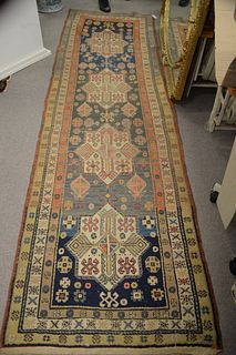 Caucasian Oriental Runner
early 20th Century 
3'2" x 11' 4"
with wear
Provenance: Thirty-five year collection of Dana Cooley, Old Lyme, Connecticut