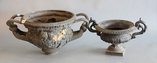 Two Planters
to include French bronze, two handled urn, having Greek gods, frieze, missing base
along with small iron urn, height 10 inches
Provenance