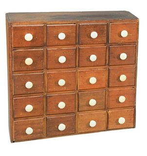 Primitive Twenty Drawer Spice Cabinet
height 31 inches, top: 11" x 33"