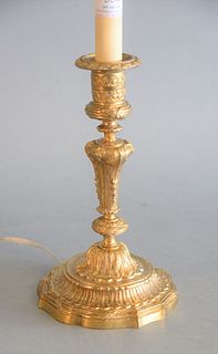 Louis XVI Style Gilt-Bronze Candlestick Lamp
with foliate and scroll cast baluster stem, on a shaped fluted foot
candlestick height 8 3/4 inches
Prove