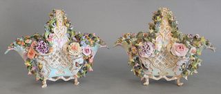 Pair Meissen Baskets 
mounted with three-dimensional flowers
(one handle repaired)
height 8 1/2 inches, length 11 1/2 inches