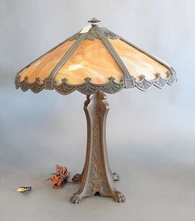 Caramel Panel Shade Table Lamp
base with claw feet
height 22 inches, diameter 20 1/2 inches
Provenance: Thirty-five year collection of Dana Cooley, Ol