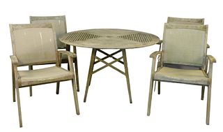 Five Piece Teak Outdoor Set
round table along with four arm chairs with mesh back and seat
height 29 inches, diameter 47 1/2 inches
Provenance: The Es