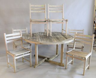 Barlow Tyrie Seven Piece Teak Set
to include round table and six chairs
height 27 1/2 inches, diameter 51 1/2 inches