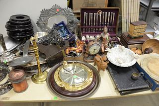 Large Group of Miscellaneous Items
to include silver plate, copper clock, Howard Miller clock, wooden ware, marble bird bowl, etc. 
Provenance: The Es
