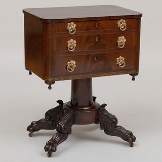 Classical Carved Mahogany and Stenciled Three-Drawer Writing Table