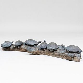 Patinated Metal Models of Turtles on a Log