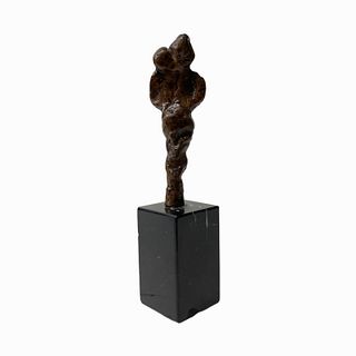 Small Hard Stone Sculpture on Black Marble Base