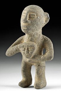 Costa Rican Stone Male Holding Trophy Head