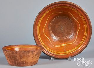 Two Pennsylvania slip decorated redware bowls