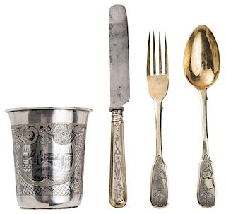 A SILVER PARCEL GILT FLATWARE SET AND NIELLOED CUP, VARIOUS MAKERS, MOSCOW, 1860-1880S