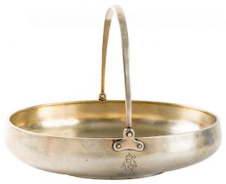 A SILVER CAKE BASKET WITH A SWING HANDLE, GRACHEV BROTHER WITH IMPERIAL WARRANT, ST. PETERSBURG, 1896-1899