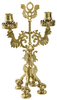 A RUSSIAN PAN-SLAVIC STYLE BRASS CANDLE HOLDER, LATE 19TH-20TH CENTURY