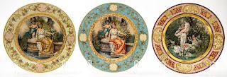 A GROUP OF THREE PORCELAIN PLATES WITH PAINTINGS BY HANS ZATZKA, LATE 19TH-EARLY 20TH CENTURY