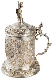 A PARCEL GILT SILVER TANKARD WITH CHASED AND REPOUSSE CLASSICAL ORNAMENT, AUSTRIAN, 19TH CENTURY