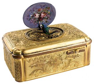 AN ANTIQUE GILT BRASS AND ENAMEL MUSIC BOX WITH A MECHANICAL SINGING BIRD, 19TH-20TH CENTURY