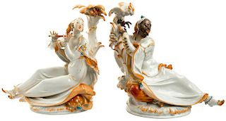 A PAIR OF PORCELAIN FIGURES OF A MOOR WITH PARROT AND LADY WITH FLUTE, MEISSEN, AFTER A MODEL BY PAUL SCHEURICH