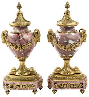 A PAIR OF LOUIS XVI STYLE ORMOLU MOUNTED PINK MARBLE URNS