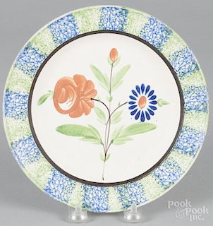 Blue and green spatterware plate, 19th c., with unusual floral decoration, 8 1/2'' dia.