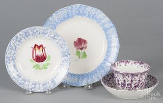 Blue spatterware tulip plate, 19th c., 8 1/4'' dia., together with a spongeware tulip plate