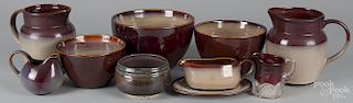 Eight pieces of Sango Nova Brown dinnerware, together with a contemporary earthenware bowl