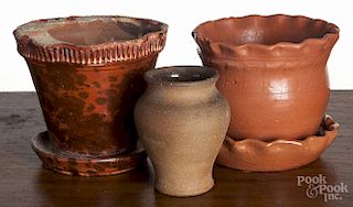 Two redware flowerpots, 20th c., together with a small vase, impressed Hickory, 4'' h.