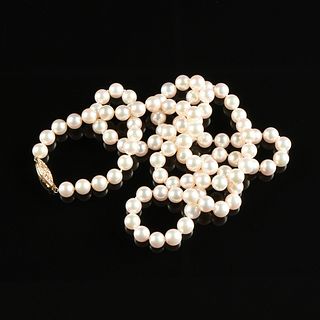 A 14K YELLOW GOLD AND PINK PEARL MATINEE LENGTH NECKLACE, 20TH CENTURY,
