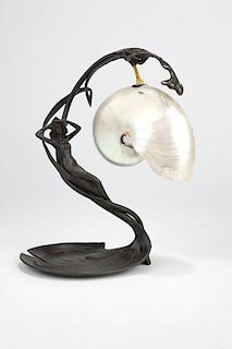 An Art Nouveau style patinated bronze table lamp