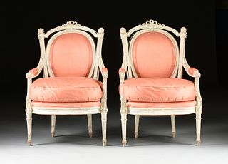 A PAIR OF LOUIS XVI STYLE WHITE PAINTED WOOD AND UPHOLSTERED FAUTEUILS,