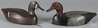 Pair of Prince Edward Island carved and painted redhead duck decoys, mid 20th c., 15 1/4'' l.