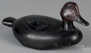 Carved and painted redhead duck decoy, mid 20th c., with incised carved heart wing detail, 13 1/2'' l.
