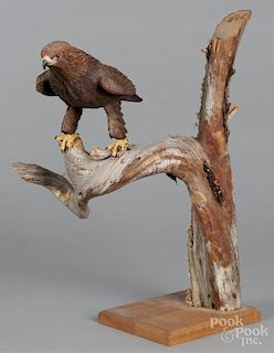 Contemporary carved eagle on a driftwood base, 16 1/2'' h.