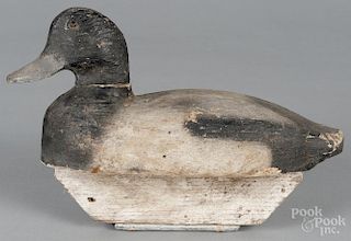 Carved and painted duck decoy, mid 20th c., with a balsa body, 12 1/2'' l.