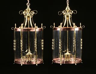 A PAIR OF REGENCY STYLE BRASS, COPPER, AND GLASS FOUR-LIGHT HALL LANTERNS, EARLY/MID 20TH CENTURY, 