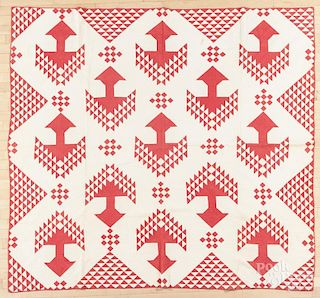 Pieced quilt, late 19th c., in a red and white Pine Tree pattern, 73'' x 80''.