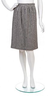 * A Bill Blass Tweed Skirt,