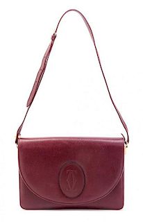 A Cartier Oxblood Leather Flap Handbag,