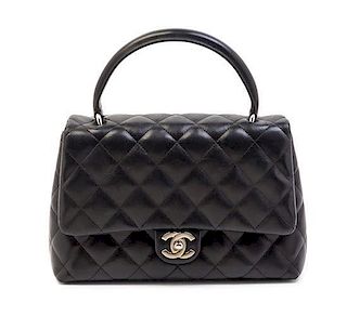 A Chanel Black Quilted Leather Handbag, 10" x 7" x 4".