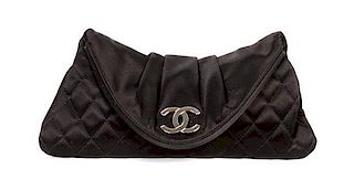 A Chanel Black Satin Partially Quilted Clutch, 11 x 5 x 1/2 inch.